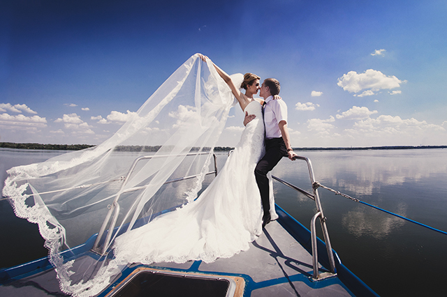 bride and groom on a boat