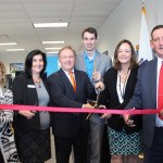 ribbon cutting ceremony for grand opening at new tewksbury location