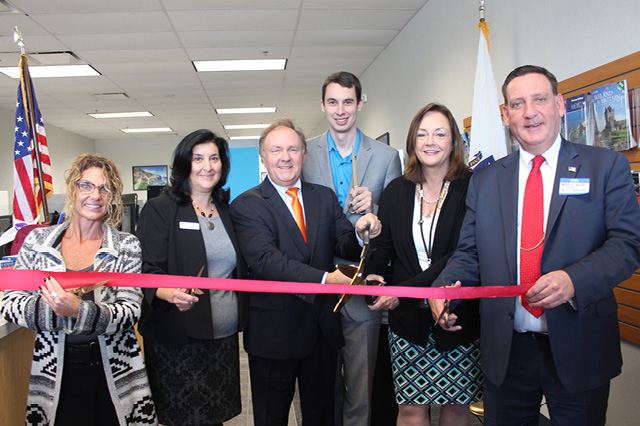 ribbon cutting ceremony for grand opening at new tewksbury location