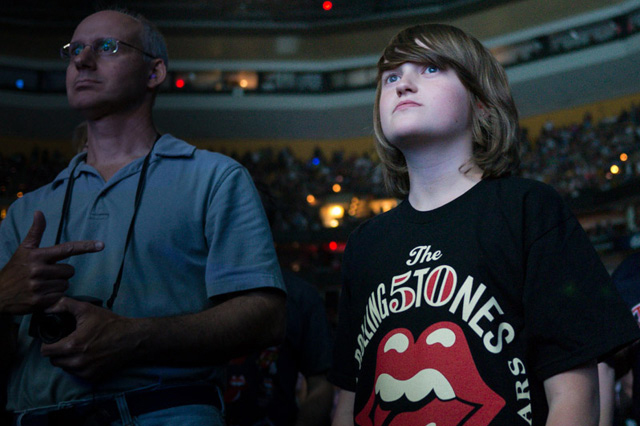 Teen wears a Rolling Stones t-shirt.