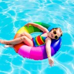 child in pool tube float