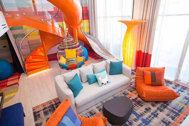 A two-story family suite, with a slide, is one way example of how the cruise industry is upping its game for travelers.
