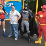 George Morse with superheroes at Six Flags New England.