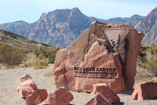 Entrance marker carved from red rock