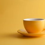 yellow cup on yellow background