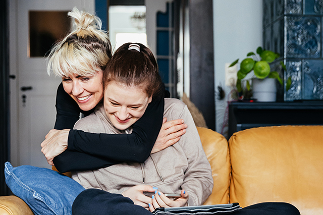 how to save on life insurance - mom and daughter hugging