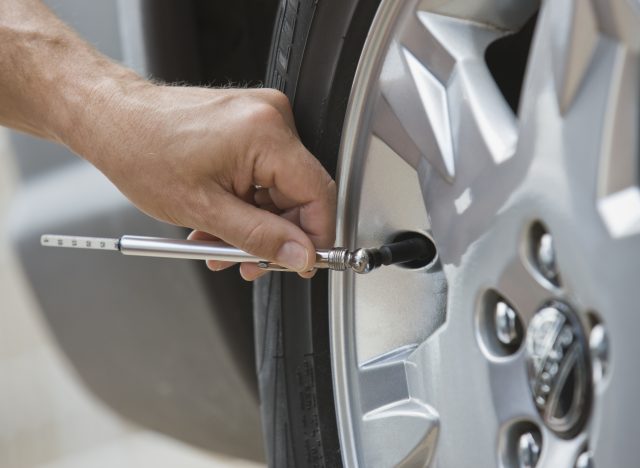 when to replace tires - checking tire pressure