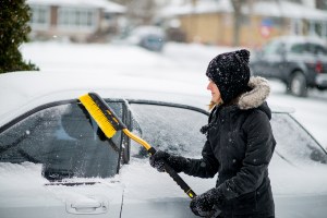 cleaning snow off car