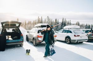 beginner ski resorts - skier in parking lot