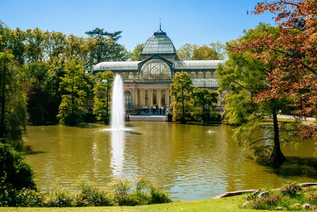 Landscape of the city of Madrid with the Crystal Palace in El Retiro park, Spain